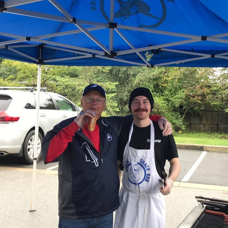 Team Aquatic Supplies owner Doug Perks and our shipper cooking at the 2019 BBQ Sale 